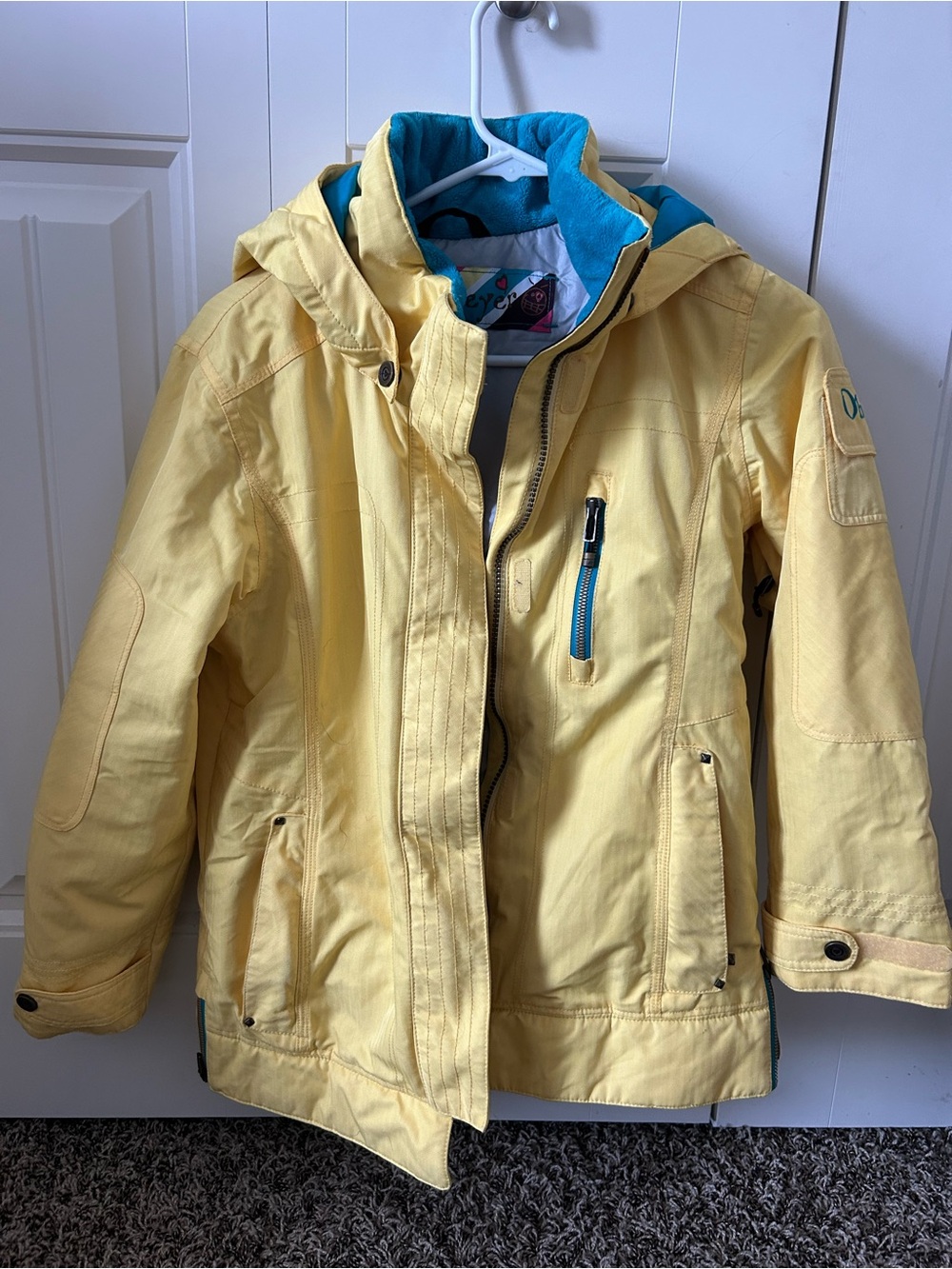Obermeyer Yellow Hooded Kids SKI jacket with Blue Lining
